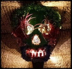 Light up mossy skull